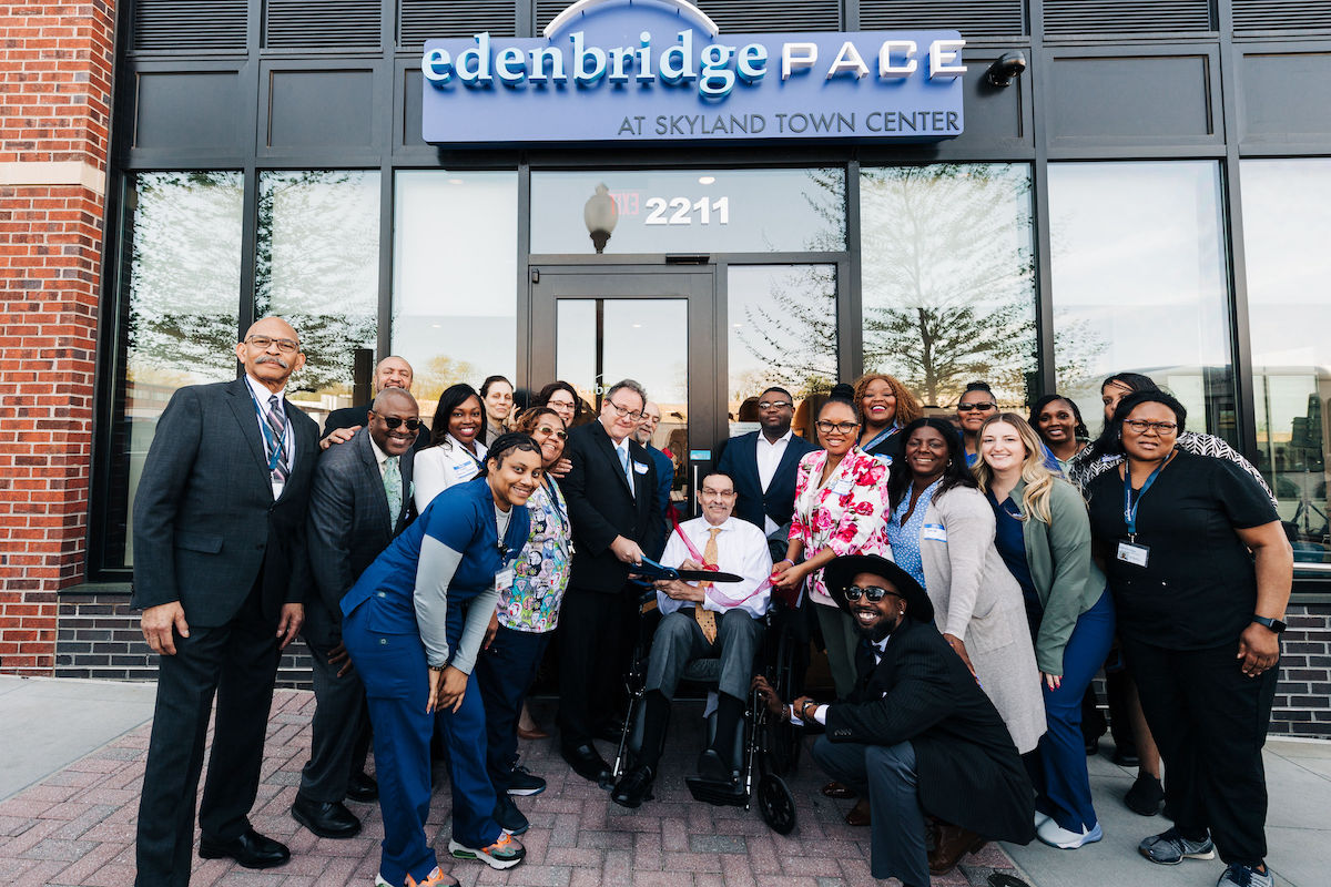 Edenbridge PACE staff members, participants and health care advocates join D.C. Council member Vincent C. Gray (D-Ward 7) and Charon P.W. Hines, acting director of the Department of Aging and Community Living, at an April 11 ribbon-cutting ceremony commemorating the health care center’s launch at Skyland Town Center. (Courtesy of Lock & Company)