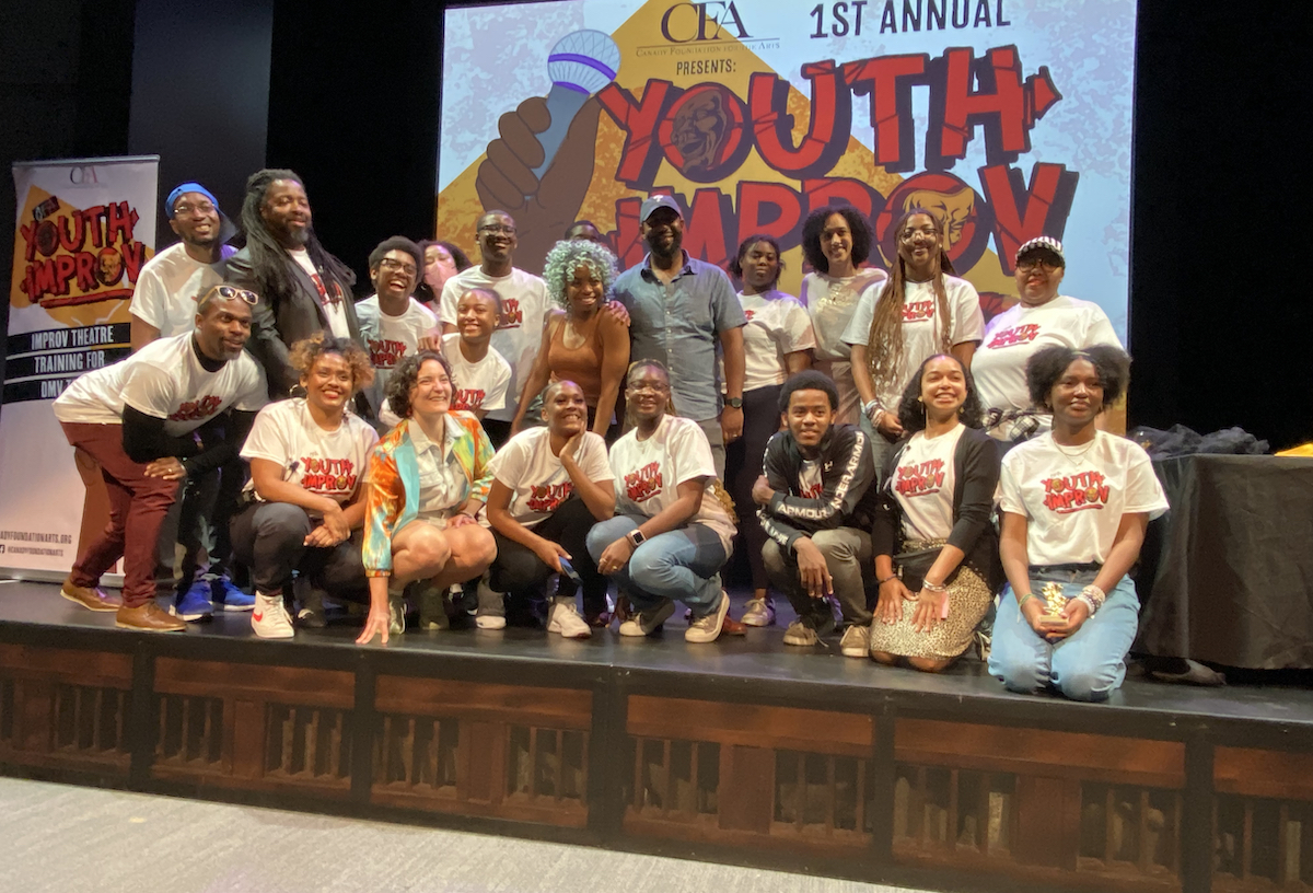 Student competitors, Canady Foundation for Arts (CFA) creative coordinators and team members pose for the Inaugural CFA Youth Improv Slam. (Micha Green/The Washington Informer)