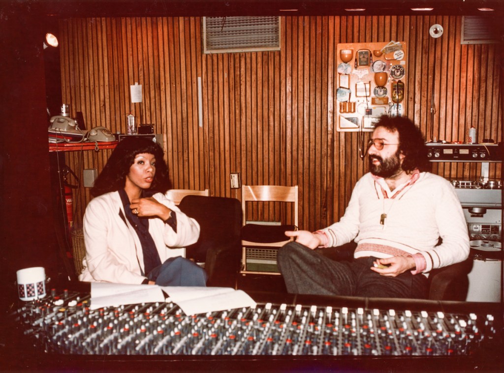 Singer Donna Summer (left) sits with famed record producer Giorgio Moroder, who helped to shape her success. The life and career of Summer are the subjects of the documentary "Love to Love You, Donna Summer" on HBO and HBO Max. (Courtesy of HBO)