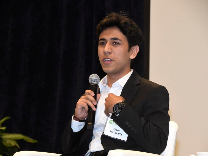 Erfan Nabizada, a climate activist and sophomore at Chevy Chase-Bethesda High School, gives a keynote speech at the conference. His involvement in activism began when he was 8 years old and growing up in Kabul, Afghanistan. (Robert R. Roberts/The Washington Informer)