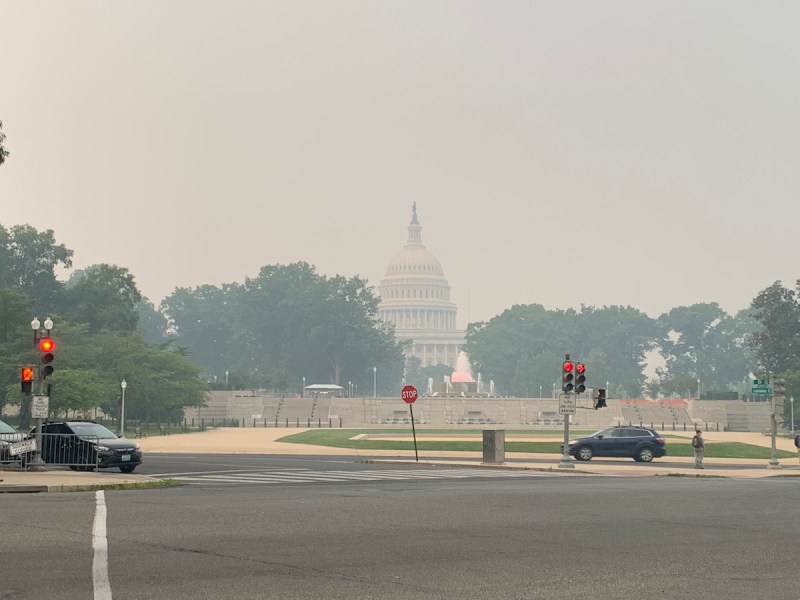 Smoke drifting into the D.C. region from Canadian wildfires shrouds the Capitol Building on June 8. (Kayla Benjamin/The Washington Informer)