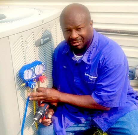 Wayne Samms of Samms Maintenance Plus makes sure an HVAC unit is ready to go before the summer heat fully sets in. (Courtesy photo)