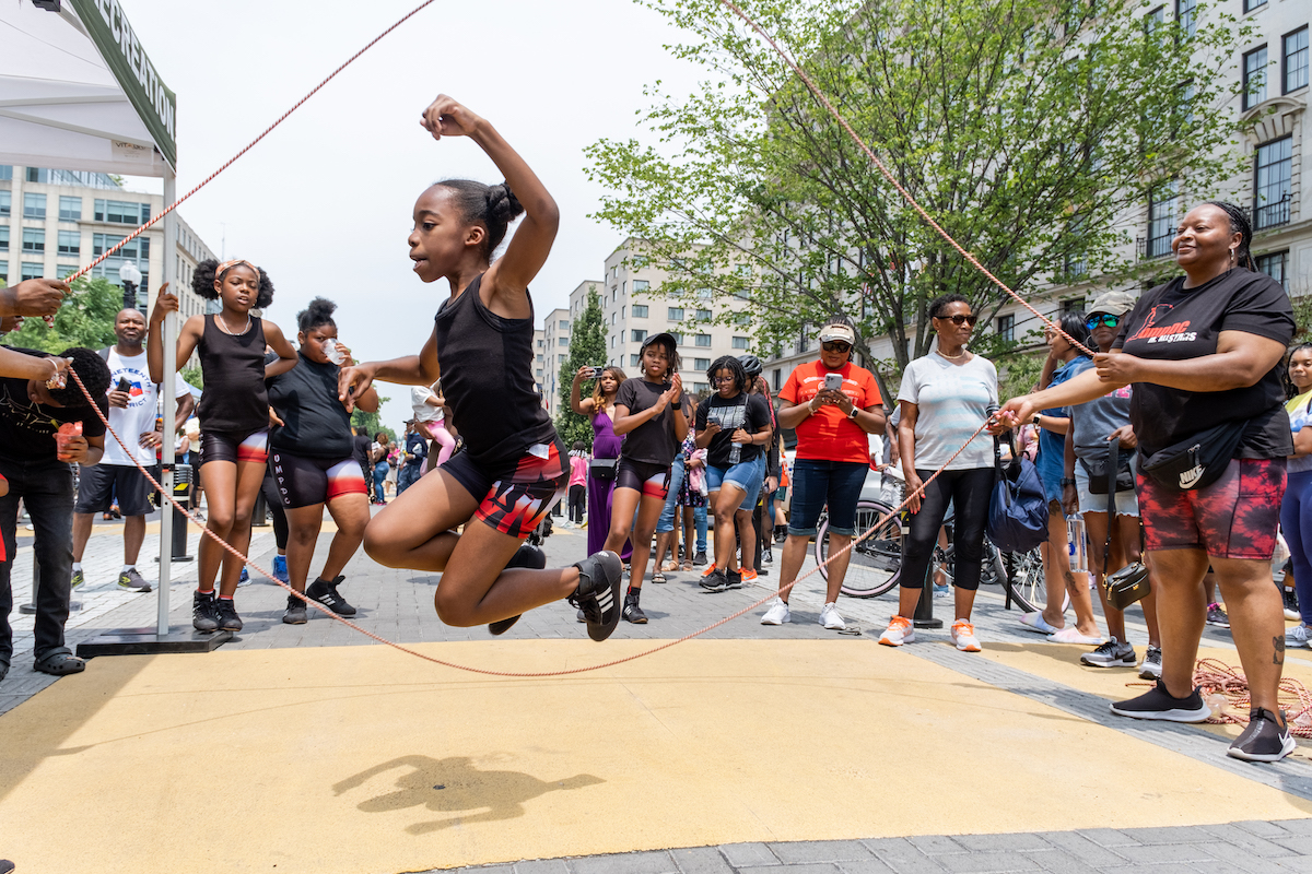 The local double-dutch team, Jump DC, shows off their skills at the District of Columbia's Juneteenth Celebration on Black Lives Matter Plaza. (Ja'Mon Jackson/The Washington Informer)