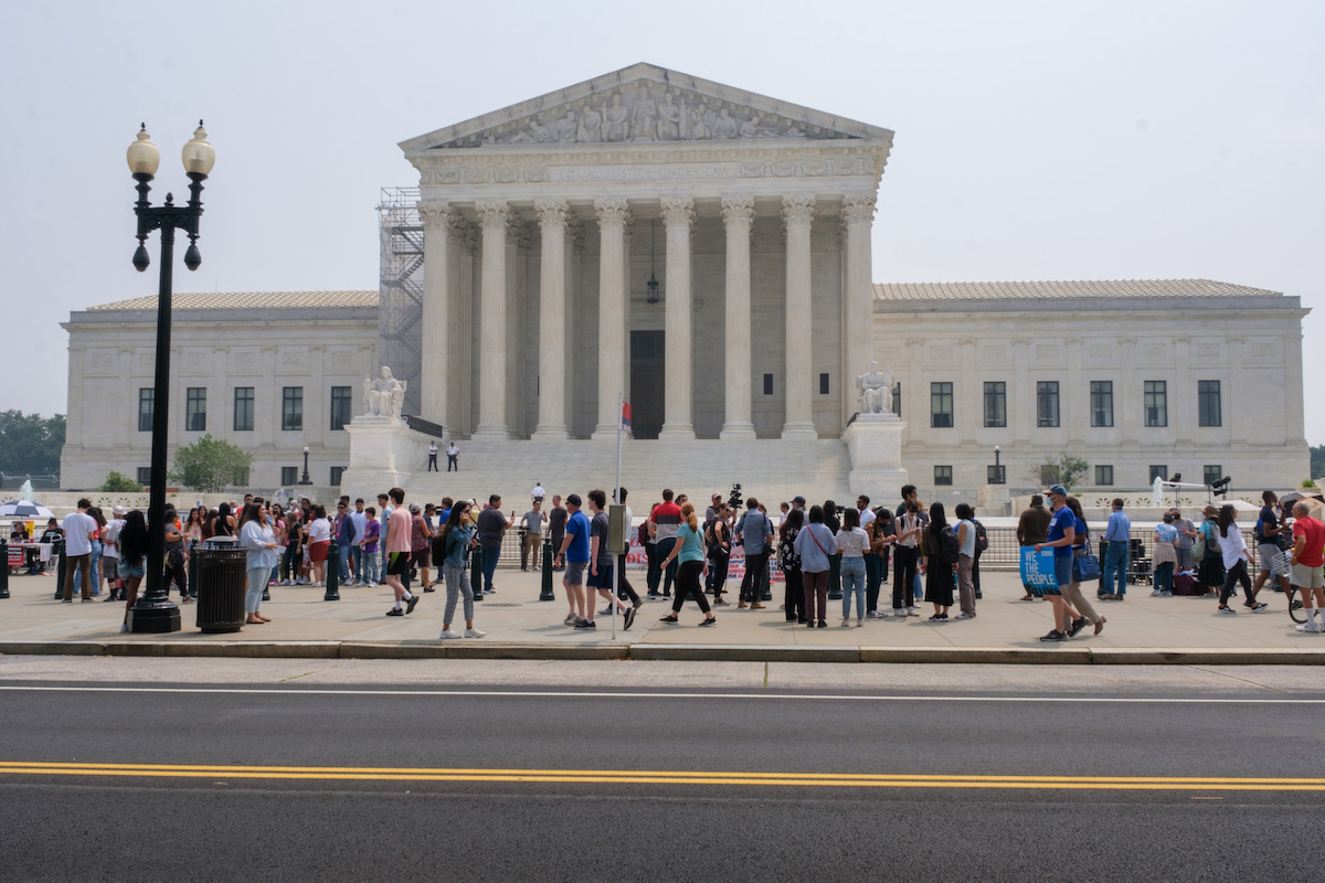 Students and protesters gather at the Supreme Court in Washington D.C., after the high court struck down affirmative action for college admissions. (Ja'Mon Jackson/The Washington Informer)