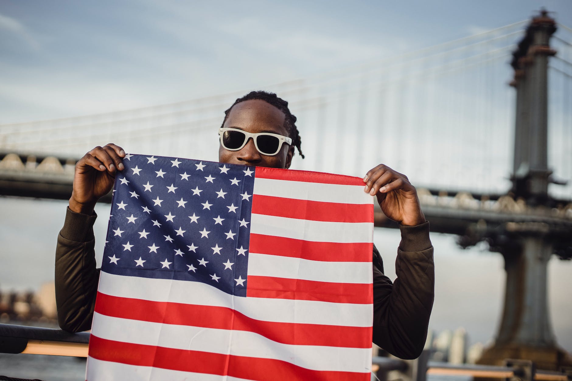 friendly man with us flag kerchief in hands