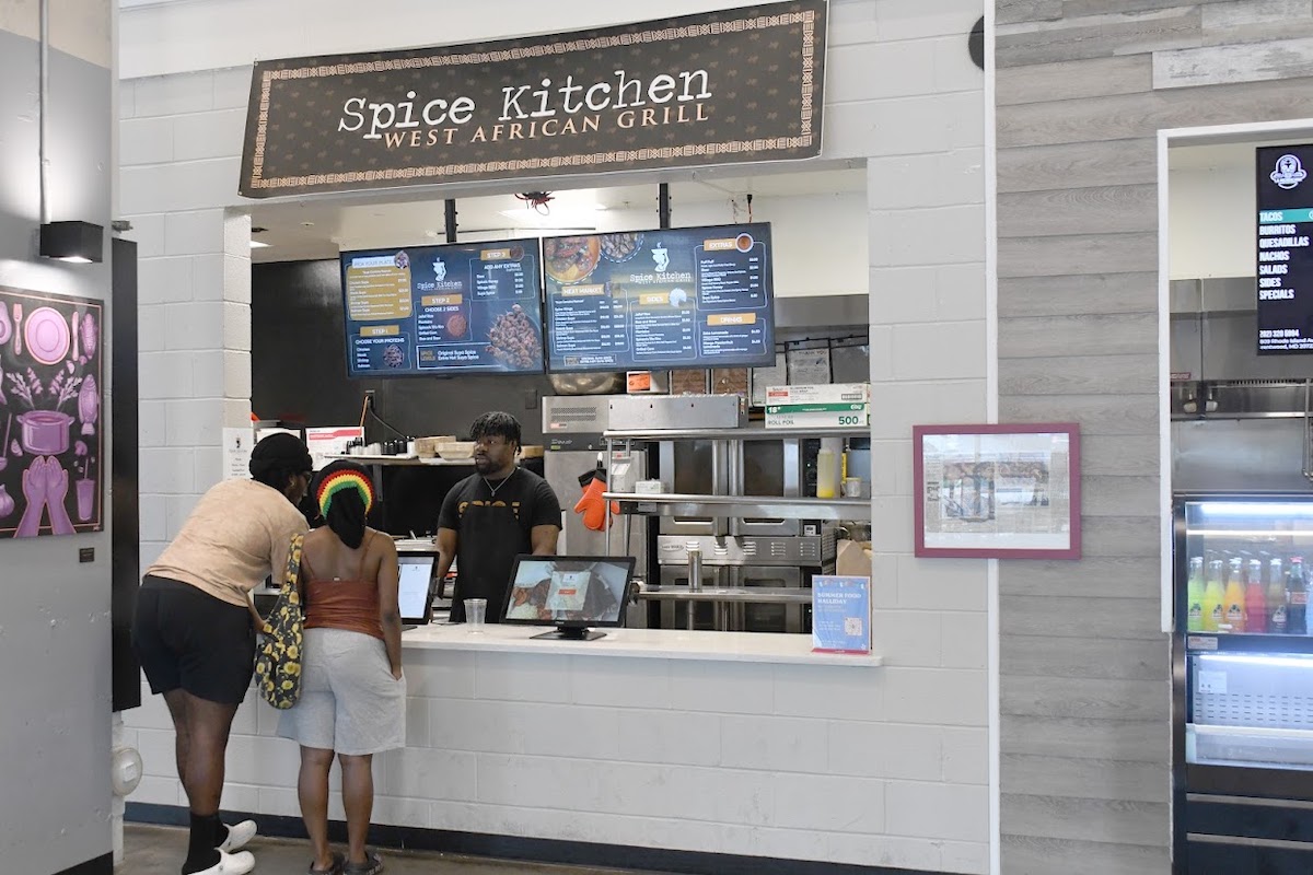 Brentwood's Spice Kitchen offers dishes such as wings and salmon with a West African twist. (Anthony Tilghman/The Washington Informer)