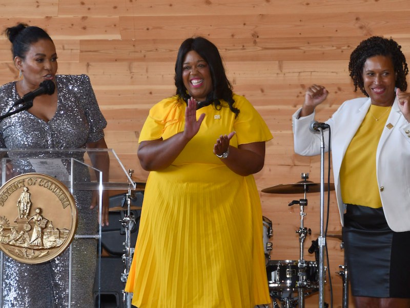 Beverly Bond of "Black Girls Rock!," Natasha Dupee, director of the Mayor’s Office on Women’s Policy and Initiatives, and D.C. Mayor Muriel Bowser at the ninth annual Women’s Equality Day mixer. (Robert R. Roberts/The Washington Informer)