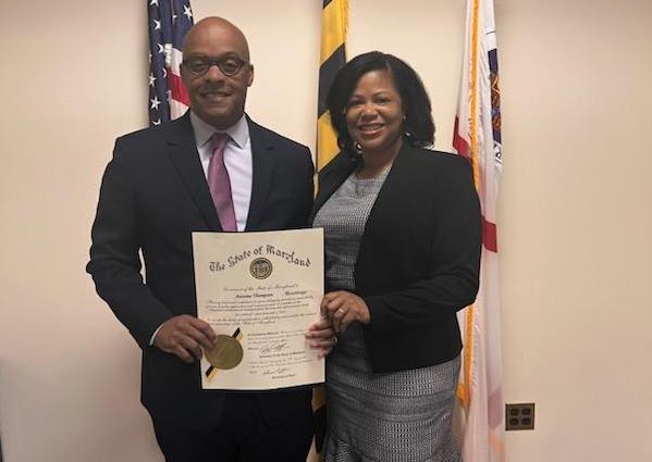 Antoine M. Thompson (left) poses for a photo at his swearing-in ceremony and oath of office for his two-year appointment by Gov. Wes Moore to the Maryland Commission on Transportation Revenue and Infrastructure Needs.