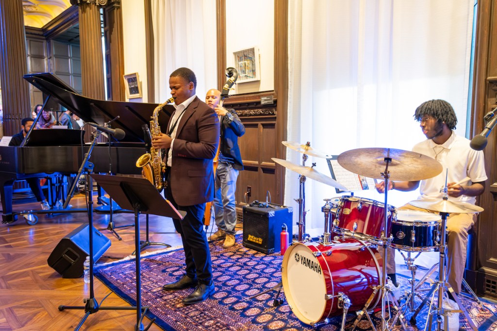 The Langston Hughes II Quartet performs during “Phillips After 5: All That Jazz,” a collaboration between The Phillips Collection and DC JazzFest. From left: Lonell Johnson III on grand piano, Chris Hon on upright bass and Hughes II on saxophone, composer and bandleader, and Kevin Kearney on drums. (Ja’Mon Jackson/The Washington Informer)