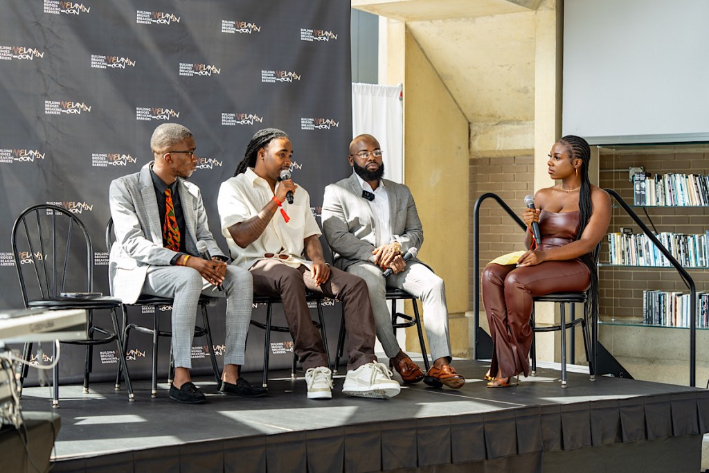 Dorian Kirkwood (second from left) of Krown Media speaks during a panel discussion at MelaninCon 2023 with entrepreneurs Abu Sillah (left) and Jerome Lewis (second from right). (Ja'Mon Jackson/The Washington Informer)