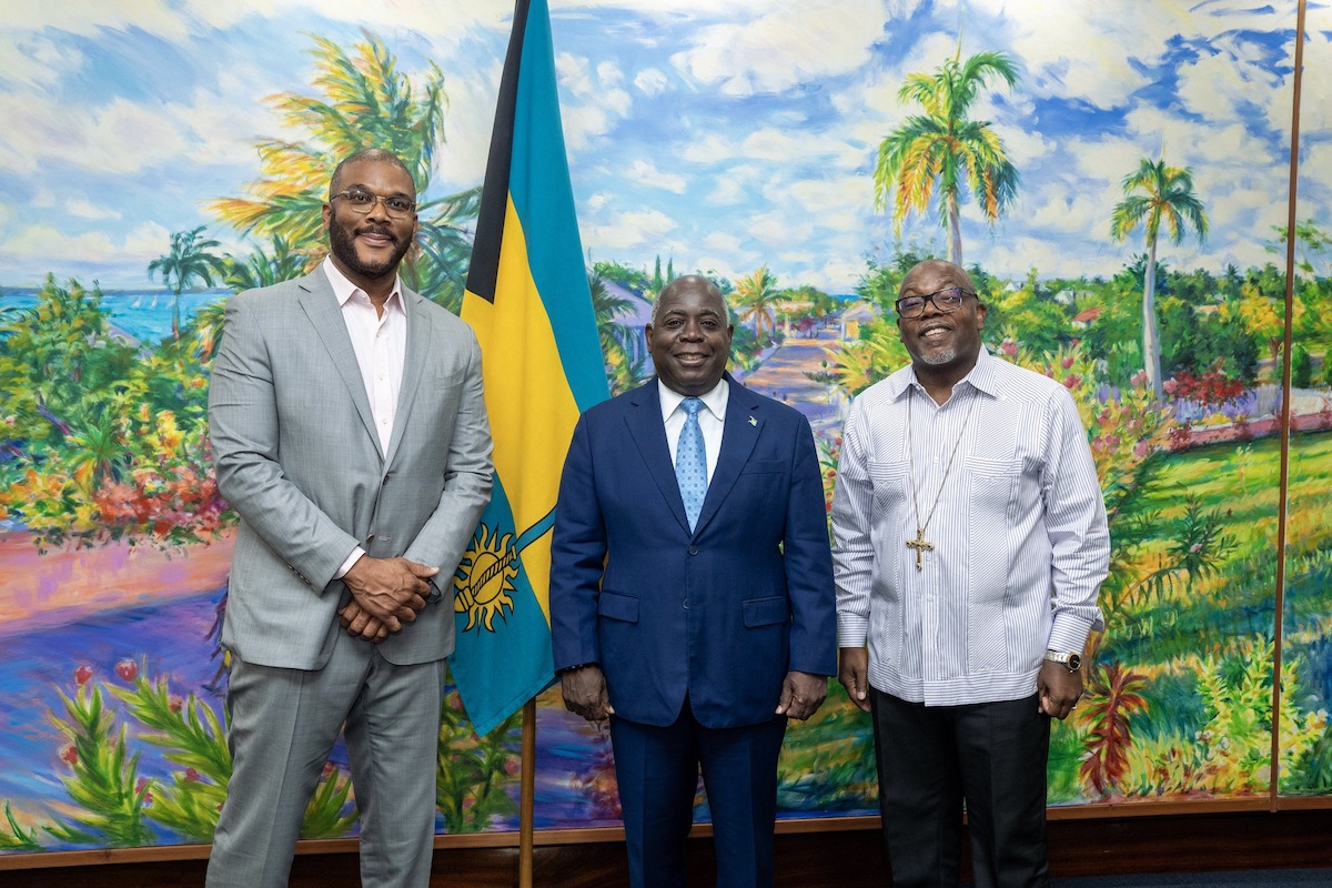 Movie mogul Tyler Perry is pictured with Bahamas Prime Minister Philip E. Davis and renowned Bahamian religious leader Bishop Neil C. Ellis (right). (Courtesy photo)