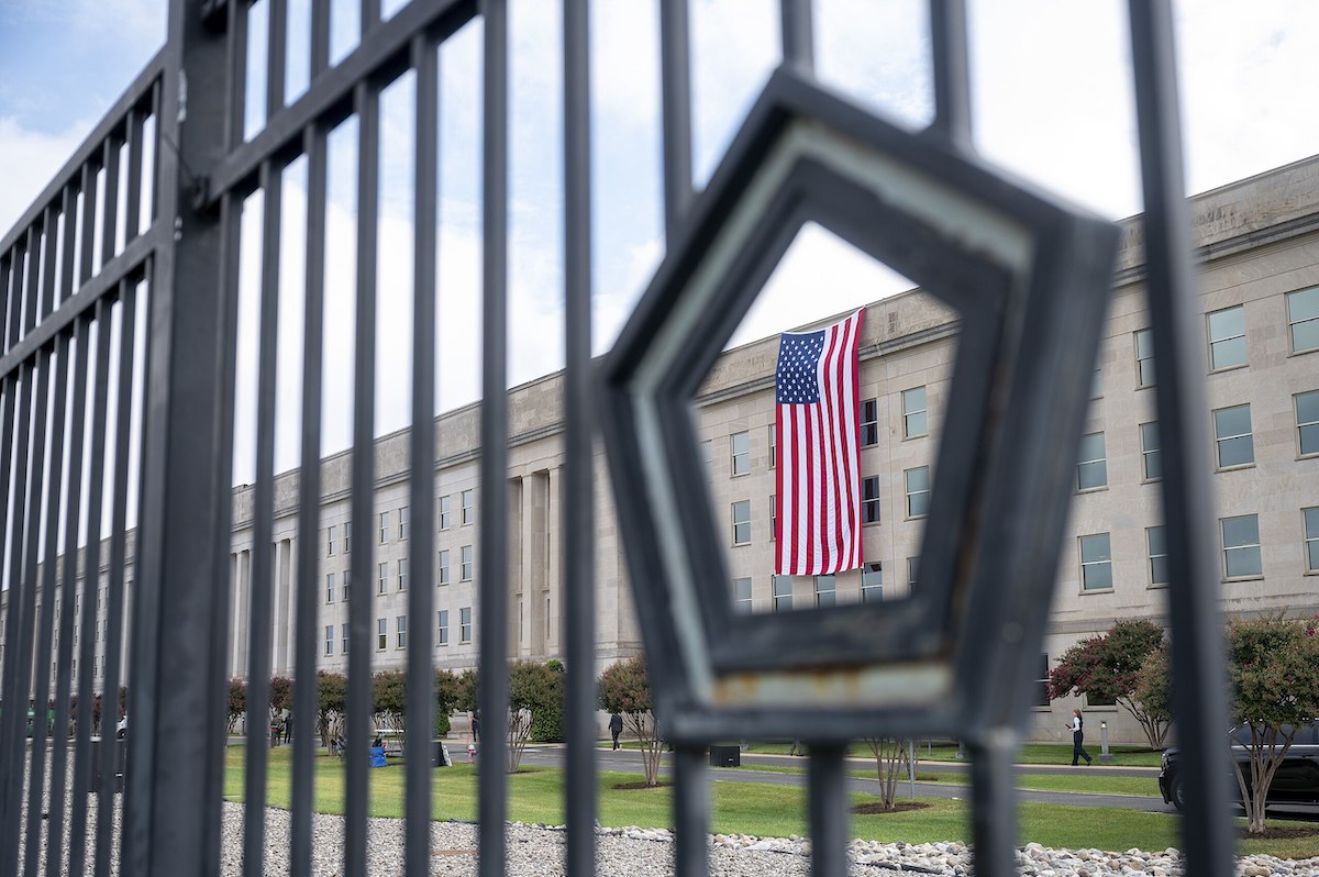 The American flag hangs over the side of the Pentagon during the 22nd 9/11 Pentagon Observance Ceremony in Washington, D.C., on Sept. 11, 2023. (DoD photo by U.S. Navy Petty Officer 1st Class Alexander Kubitza)