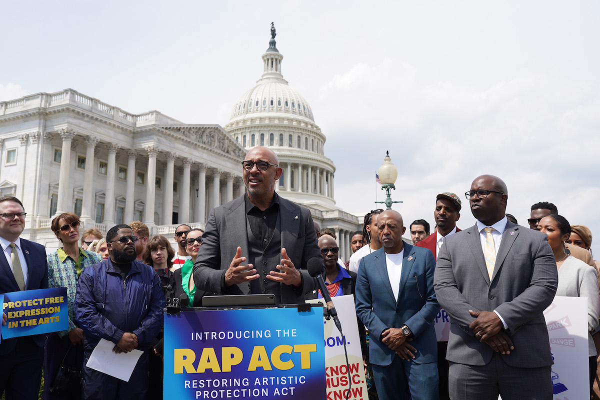 Harvey Mason Jr. (center), CEO of the Recording Academy (Grammys), speaks at a press conference on Capitol Hill in April 2023 surrounded by members of Congress and Recording Academy members about the Restoring Artistic Protections (RAP) Act. (Courtesy Photo/Recording Academy, Leigh Vogel for Getty Images)