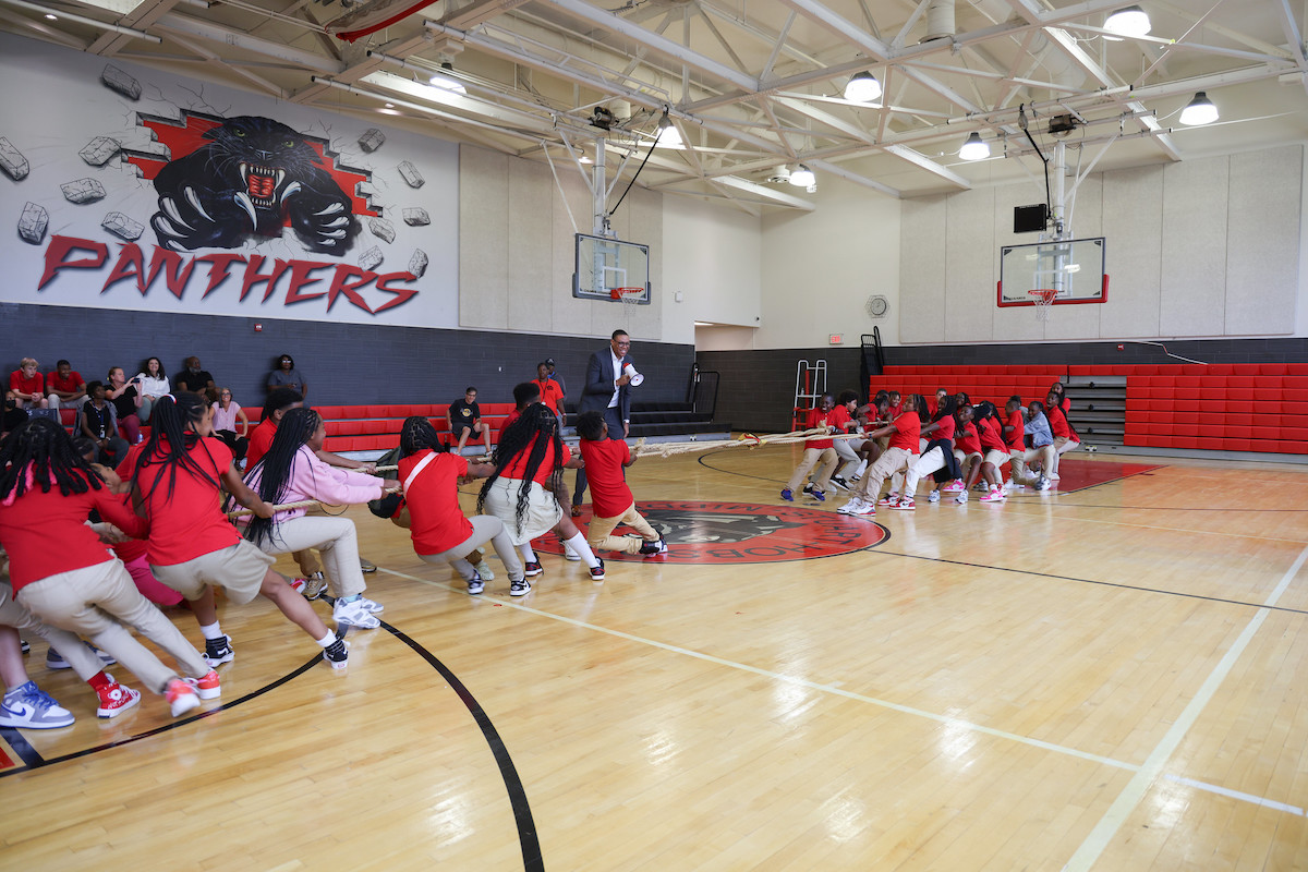 DCPS Chancellor Dr. Lewis Ferebee referees a tug-of-war game between groups of sixth graders at Stuart-Hobson Middle School in Northeast. Stuart-Hobson Middle School counts among 11 District public schools hosting a sixth grade academy. (Courtesy of DCPS Chancellor Lewis Ferebee via X)