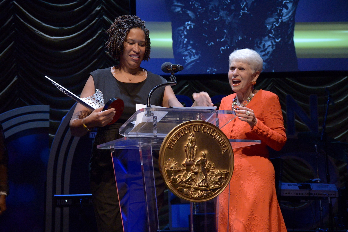 D.C. Mayor Muriel Bowser awards Jan Du Plain at the 38th annual Mayor’s Arts Awards at the Lincoln Theatre in Northwest D.C. on Sept. 28. (Roy Lewis/The Washington Informer)