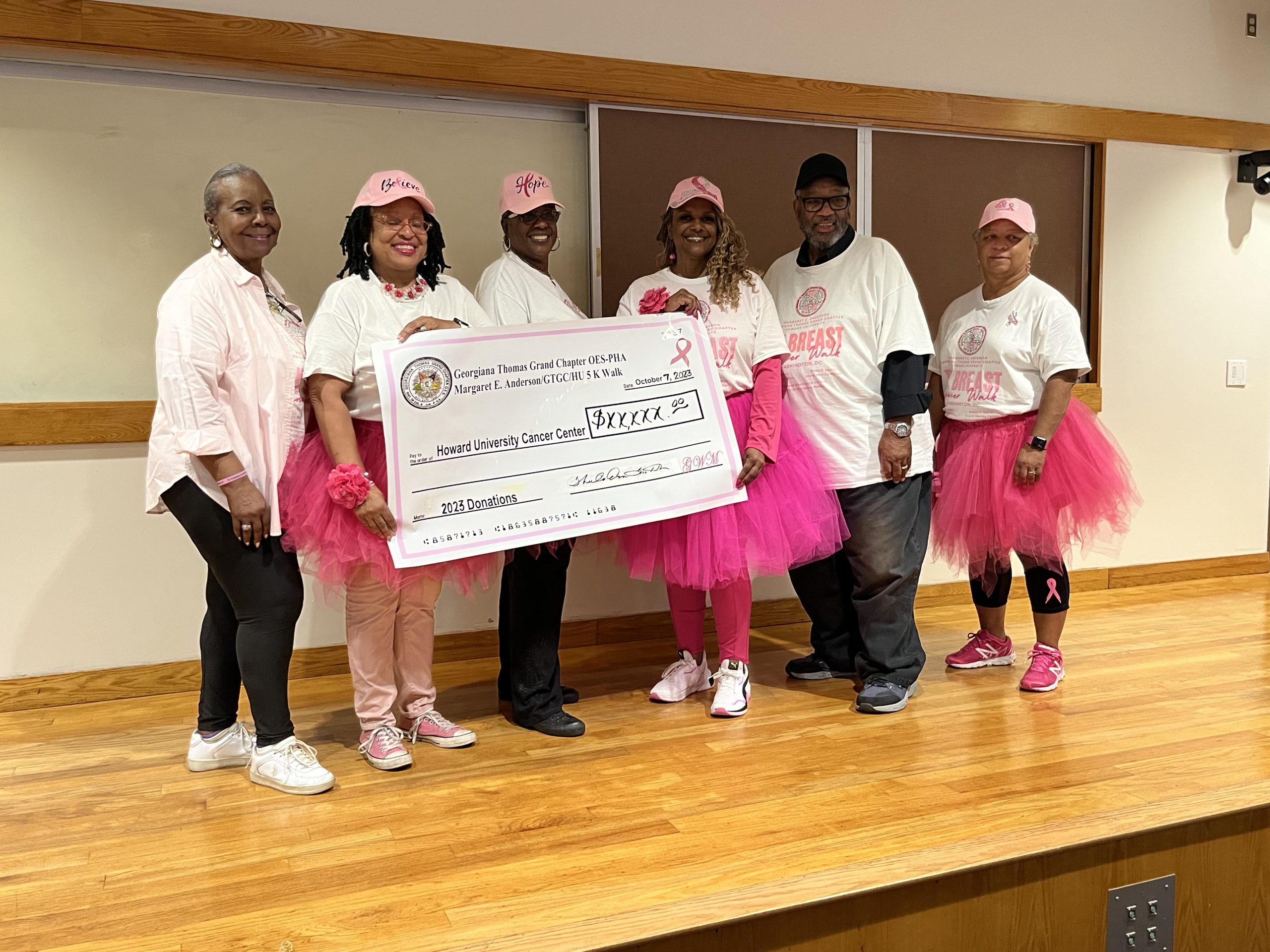 In honor of Breast Cancer Awareness Month, members of the Georgiana Thomas Grand Chapter Order of the Eastern Stars participated in a 5K Walk and donated money to the Howard University Cancer Center. (Hamil R. Harris/The Washington Informer)