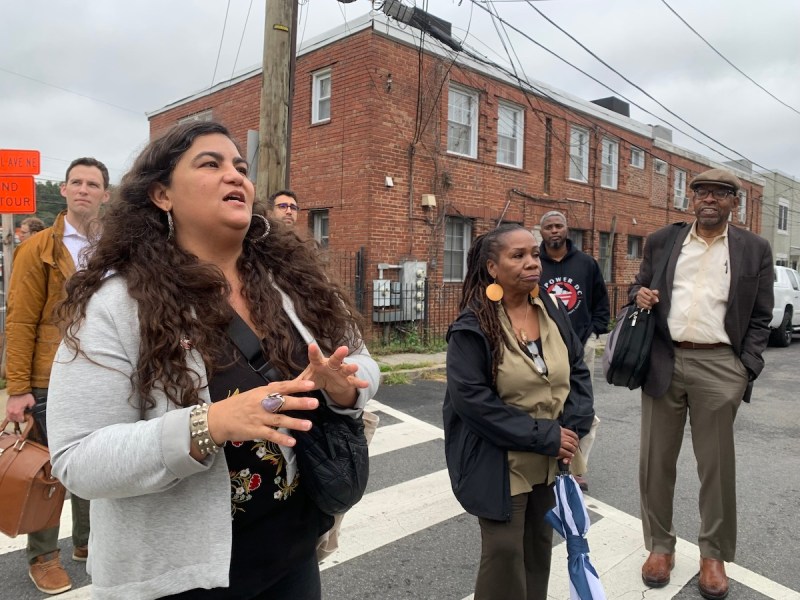 Parisa Norouzi, executive director of community justice group Empower DC, leads a “toxic tour” highlighting pollution from a chemical factory and the fight for green space in the Ivy City neighborhood Sept. 26. (Kayla Benjamin/The Washington Informer)