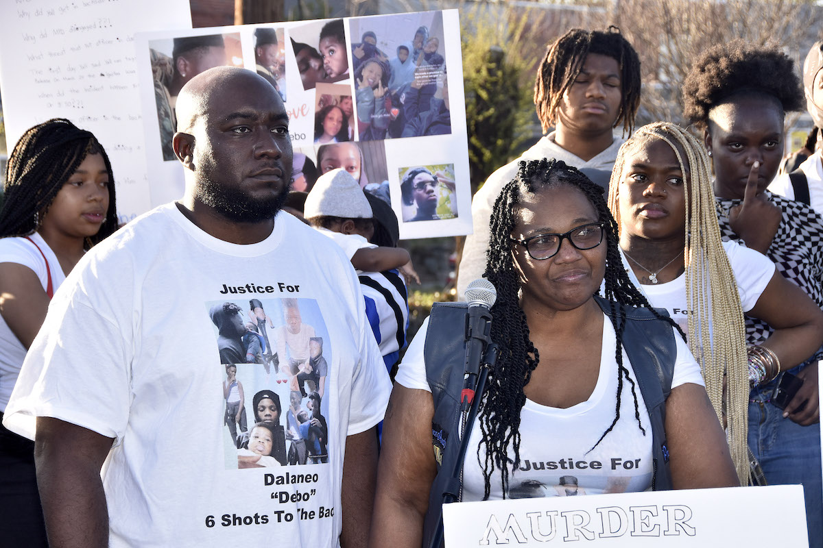 **FILE** Andrew O. Clarke, lawyer for the Wilson and Martin families, and Dalaneo Martin’s mother, a member of the Coalition of Concerned Mothers, at a vigil for 17-year-old Dalaneo in March 2023 (Robert R. Roberts/The Washington Informer)