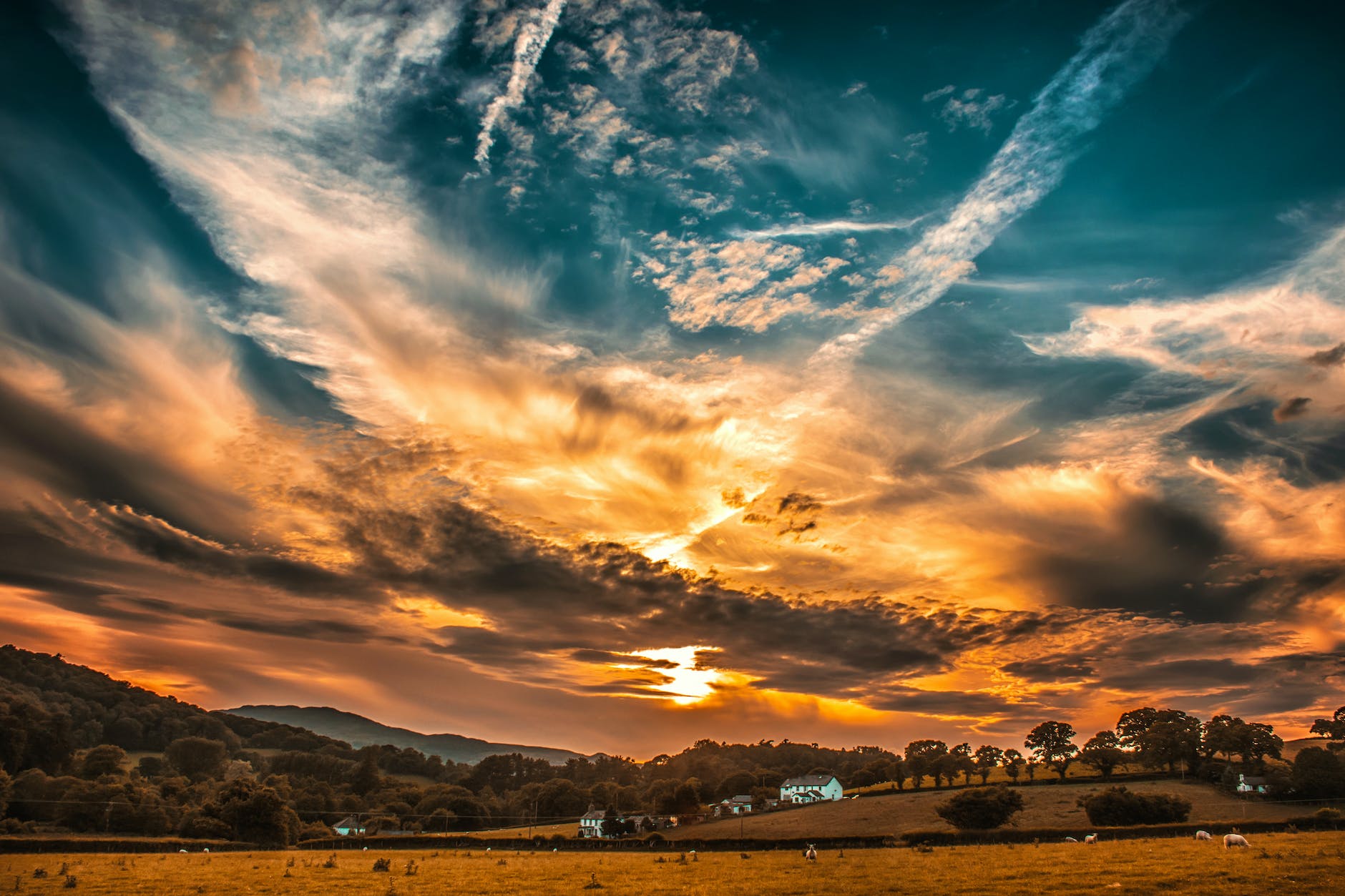 orange and blue skies during sunset