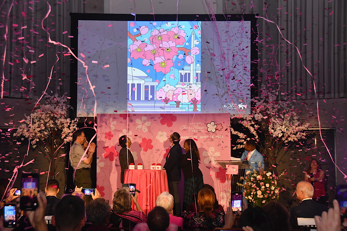 The National Cherry Blossom Festival rolls out plans for the 2024 festival running from March 20-April 14 and unveils the official 2024 artwork by Nicolas Shi during an event on Nov. 15. (Robert R. Roberts/The Washington Informer)