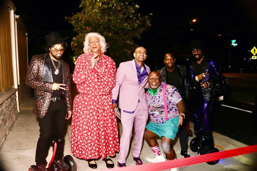 Da Party Crasherz, character impersonators, pose with local music veteran Bo Sampson on Oct. 19. (Courtesy photo)