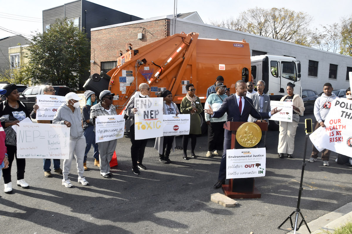 Ward 5 Council member Zachary Parker announced his introduction of new environmental justice legislation on Monday in Ivy City, a neighborhood facing numerous sources of pollution — including from the many large diesel-powered vehicles that pass by daily. (Robert R. Roberts/The Washington Informer)
