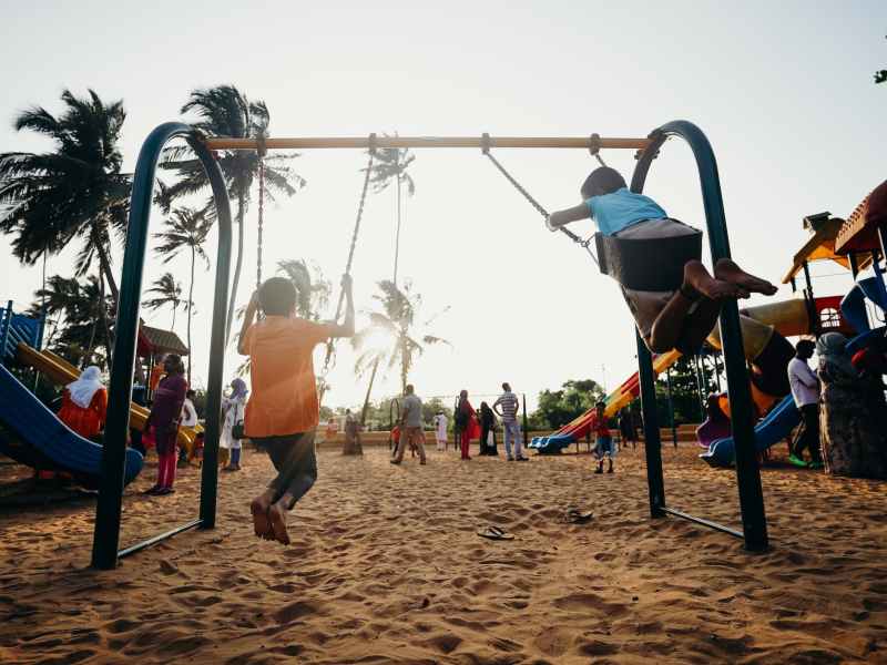 children playing on swing
