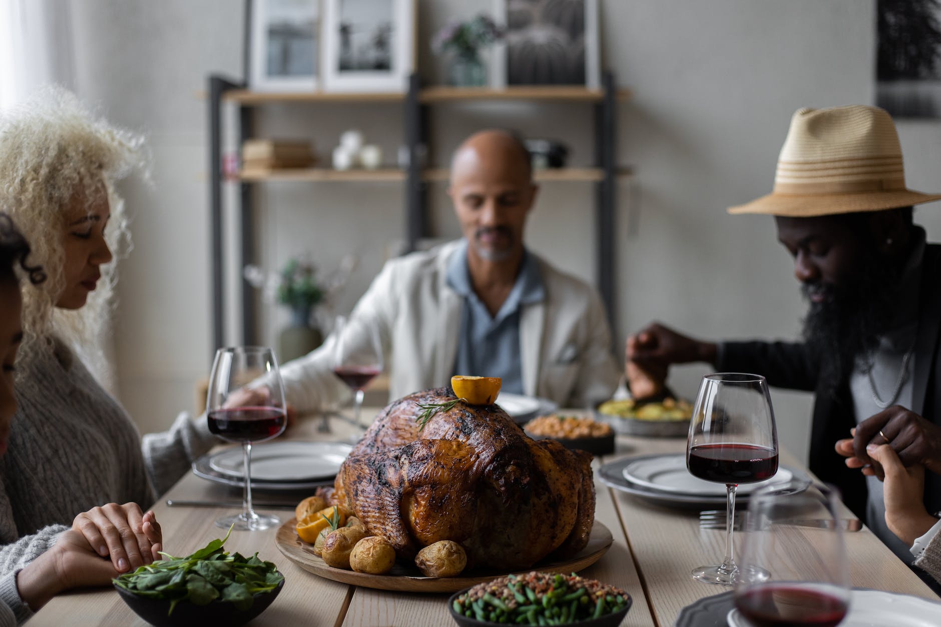 diverse people praying on thanksgiving
