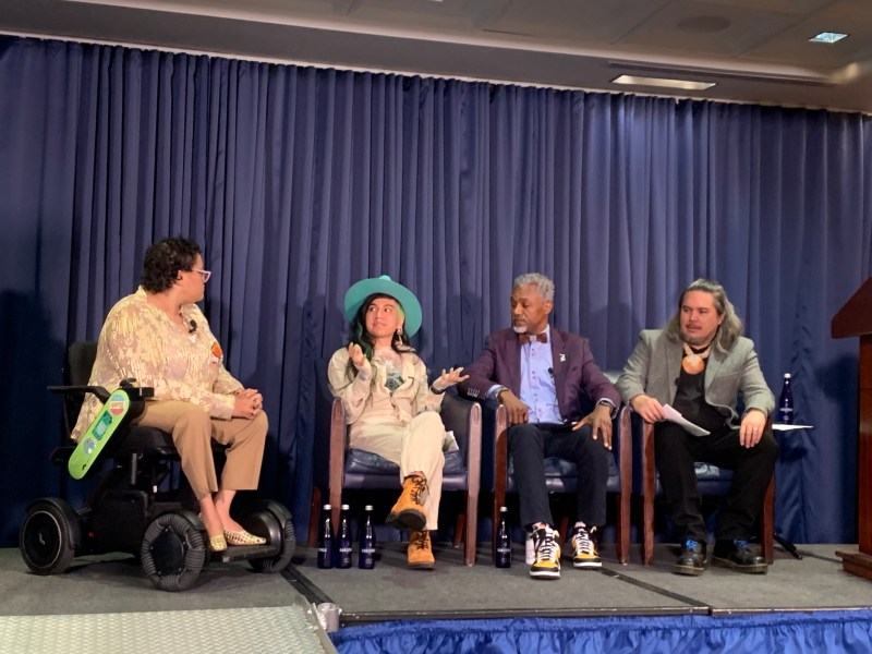 A panel of experts speaks at an event following the release of Green 2.0’s annual report card examining diversity in the environmental sector. From left: Daphne Frias, climate and disability activist; Pinar Ateş Sinopoulos-Lloyd, co-founder of Queer Nature; James Page, global chief diversity, equity, and inclusion officer for The Nature Conservancy; Angelo Villagomez, senior fellow at the Center for American Progress. (Kayla Benjamin/The Washington Informer)
