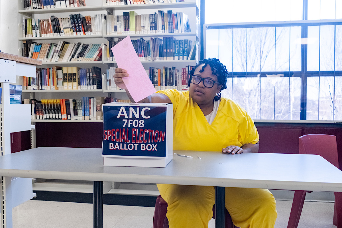 Incarcerated citizen Shameka Hayes casts her ballot during the Advisory Neighborhood Commissioner (ANC) election. Hayes was elected as 7F08 advisory neighborhood commissioner. (Ja'Mon Jackson/The Washington Informer)