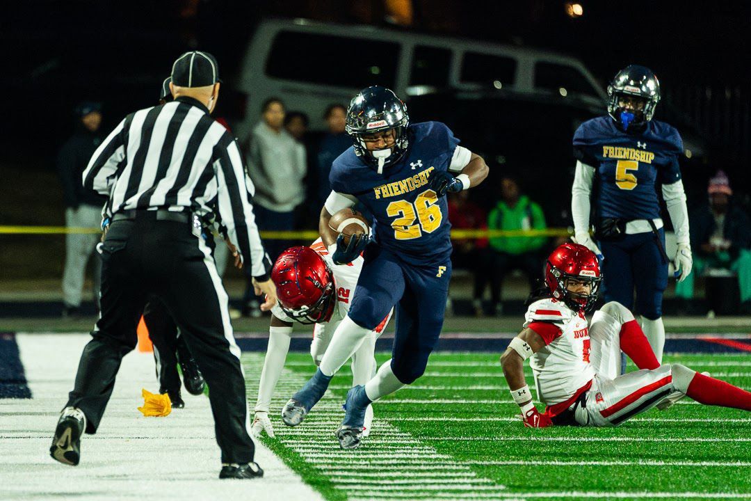 Friendship Collegiate Public Charter School defeated Dunbar High School during the DCSAA Football Class AA Championship. Friendship running back Darmarjae Jones (26) scored a touchdown win over Dunbar. (Marcus Relacion)