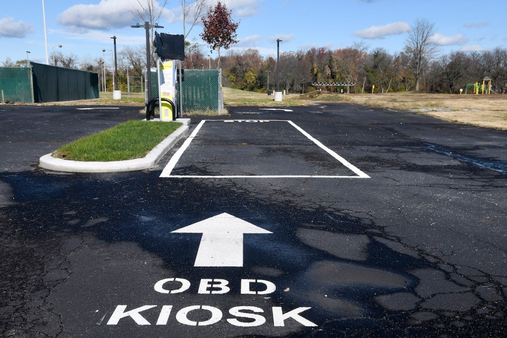 A self-service car emissions testing site, built by the city earlier this year within the boundaries of Kenilworth Park, sits unopened in late November. The land, owned by the National Park Service, is reserved for recreational use. (Robert R. Roberts/The Washington Informer)