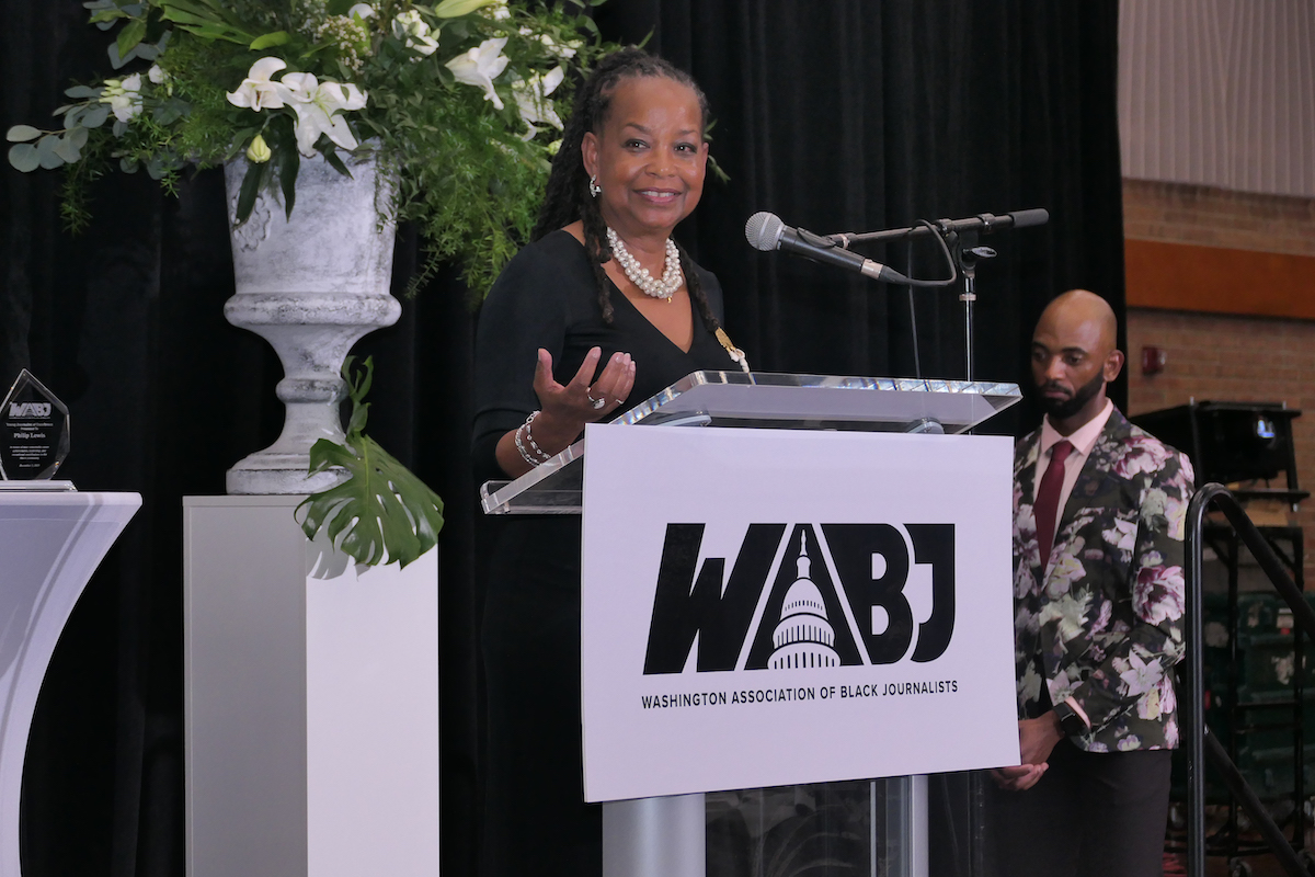 Washington Informer Publisher Denise Rolark Barnes accepts the President's Award from the Washington Association of Black Journalists during their gala held at the Blackburn Center on Dec. 2. (Shevry Lassiter/The Washington Informer)