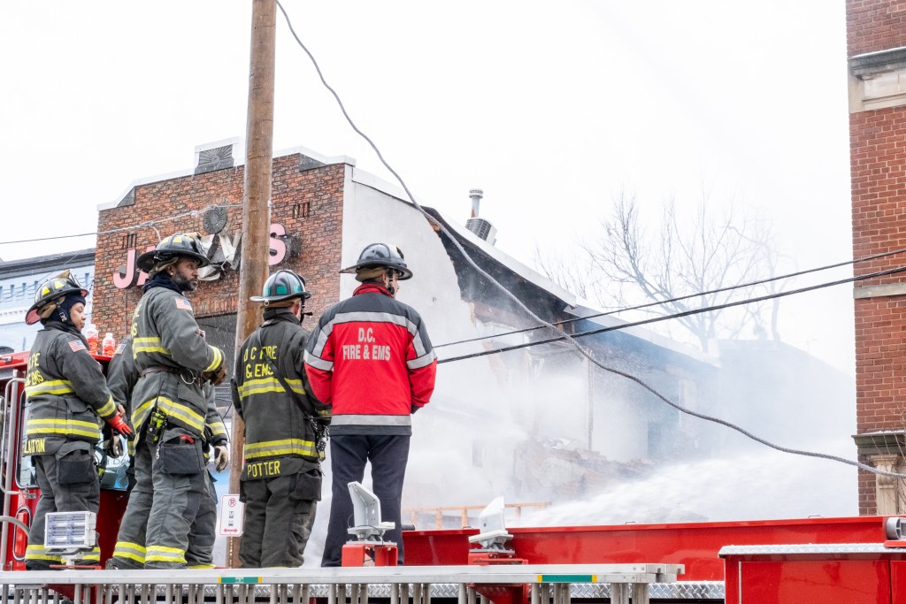 A gas explosion on Marion Barry Avenue SE destroyed a D.C. convenience store on Jan. 18, causing minor injuries to one person hit by flying debris. (Ja'Mon Jackson/The Washington Informer)