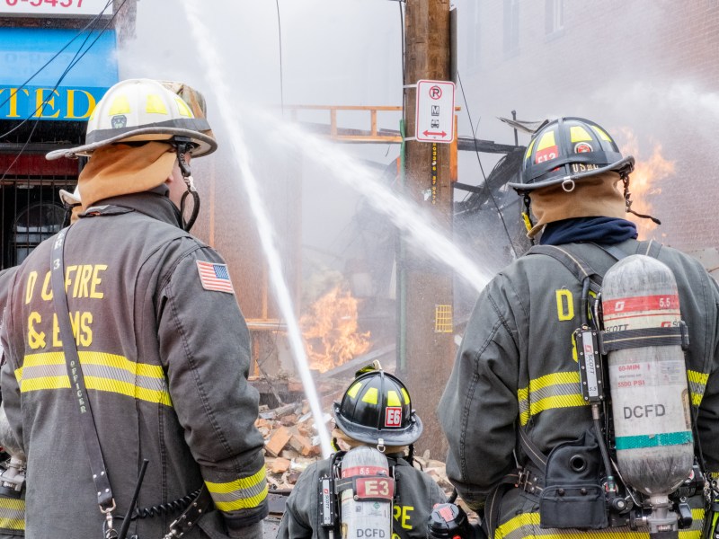 A gas explosion on Marion Barry Avenue SE destroyed a D.C. convenience store on Jan. 18, causing minor injuries to one person hit by flying debris. (Ja'Mon Jackson/The Washington Informer)