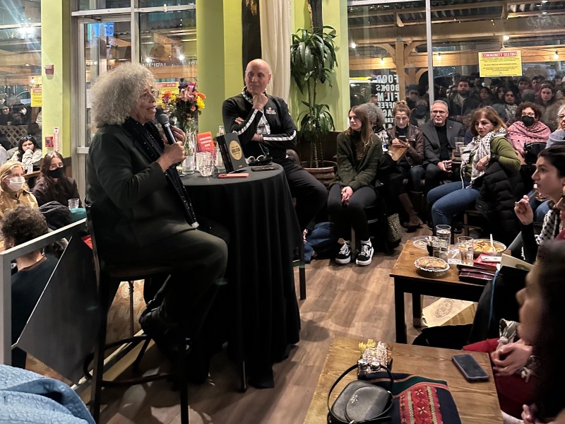 Busboys and Poets owner Andy Shallal and Angela Davis on Jan. 23 during the restaurant chain’s Palestine Week (Bousaina Ibrahim/The Washington Informer)