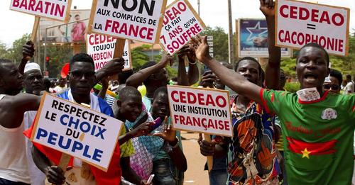 Supporters of Capt. Ibrahim Traoré, military leader of Burkina Faso, protest against France and the West African regional bloc known as ECOWAS in the streets of Ouagadougou, Burkina Faso, Oct. 4, 2022. (Courtesy of Africa News)