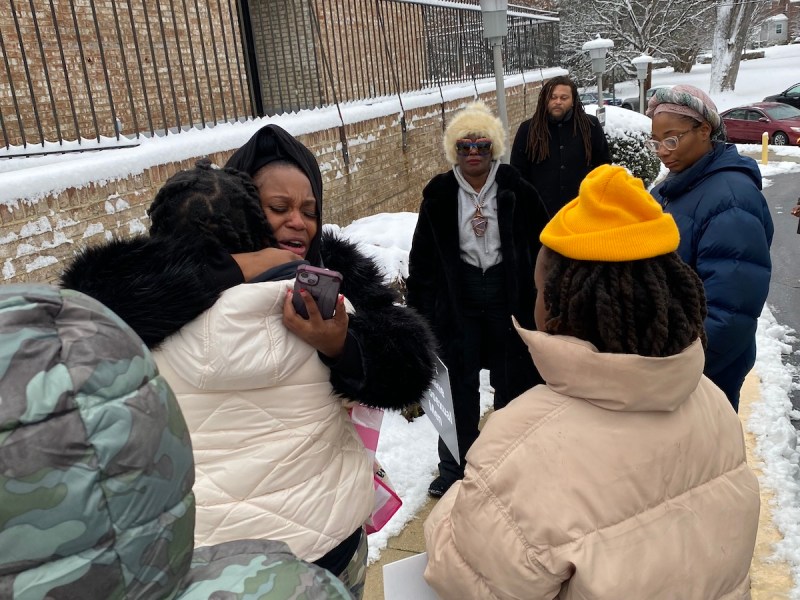 Aziyrah Peters (center) is at odds with administrators at the Hospital for Sick Children Pediatric Center in Northeast about the medical care that her 2-year-old, Ramyah Peters, has been receiving. (Courtesy photo)