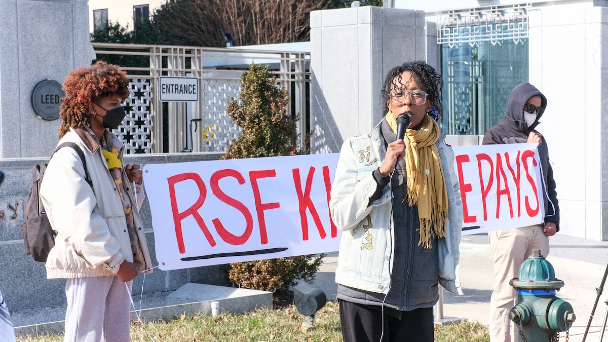 Wafa May speaks during a protest she co-organized against the war, genocide and mass displacement in Sudan at the Embassy of the United Emirates on Feb. 18. (Ja’Mon Jackson/The Washington Informer)