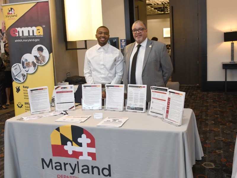 Members of Maryland’s General Services Administration attended the Chamber of Commerce breakfast to distribute information. Sean Stinnet (right) is adamant about extending resources to minority businesses across the state. (Anthony Tilghman/The Washington Informer)