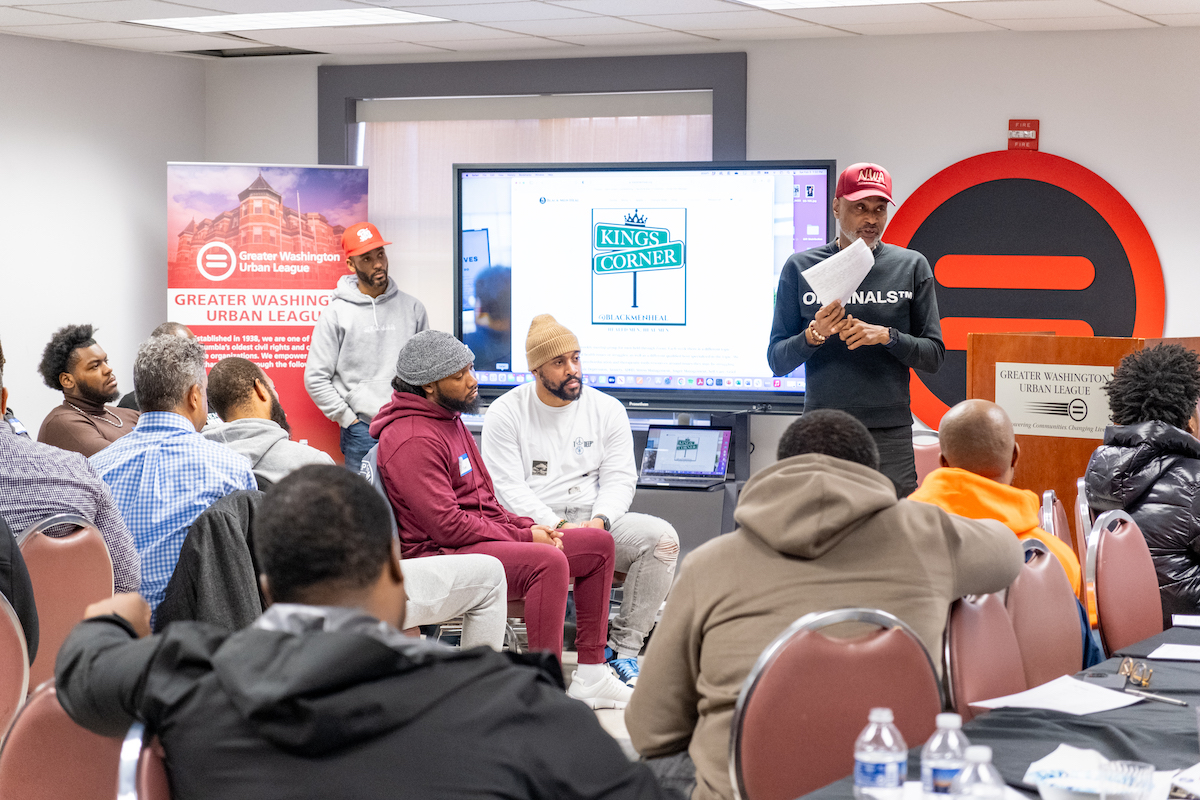 Mark Harrison reading a letter he wrote to his father during the 2024 Kings Corner Tour: Letters To My Father at the Greater Washington Urban League. (Ja'Mon Jackson/The Washington Informer)