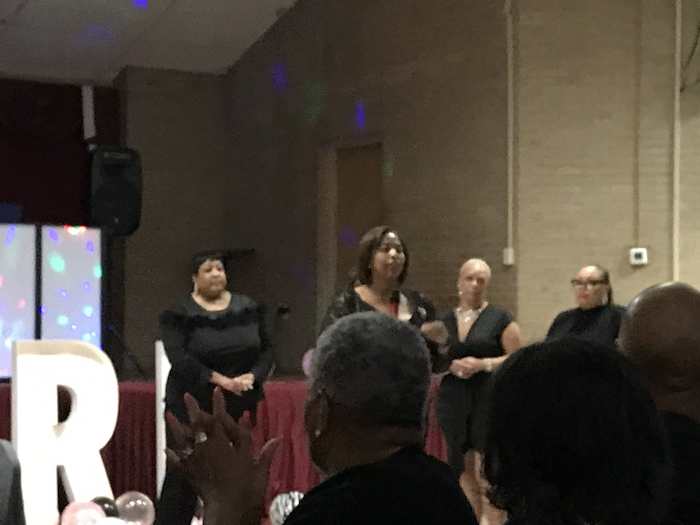 Stephanie Byrd (front center) with board members of the Sylvia Ruth Foundation at the organization's Sneaker Ball on March 23 at St. Timothy’s Episcopal Church in Southeast D.C. (Micha Green/The Washington Informer)