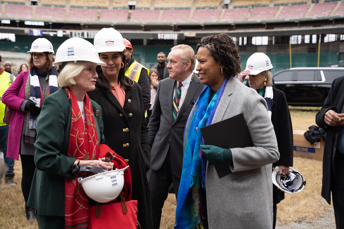 **FILE** Events DC holds a "Farewell RFK Stadium" event in December 2022, attended by Mayor Muriel Bowser (right) and city leaders and residents. (WI photo)
