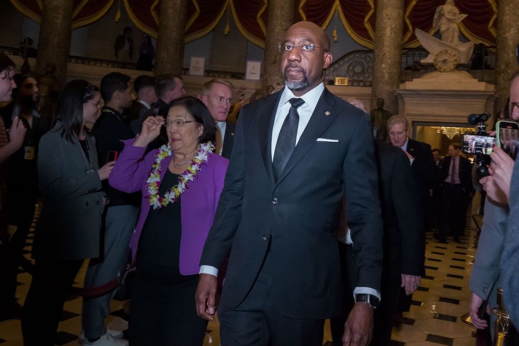 Sen. Raphael Warnock, Georgia Democrat, enters the U.S. Capitol for President Joe Biden’s State of the Union address on March 7. (Shedrick Pelt/The Washington Informer)