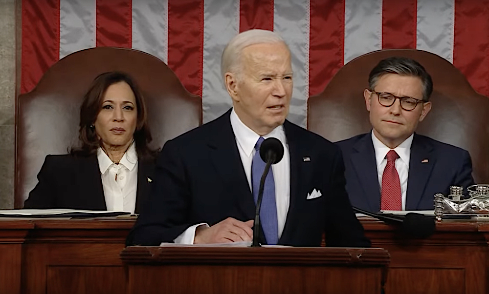 President Joe Biden delivers the 2024 State of the Union address at the U.S. Capitol on March 7 as Vice President Kamala Harris (left) and House Speaker Mike Johnson listen.