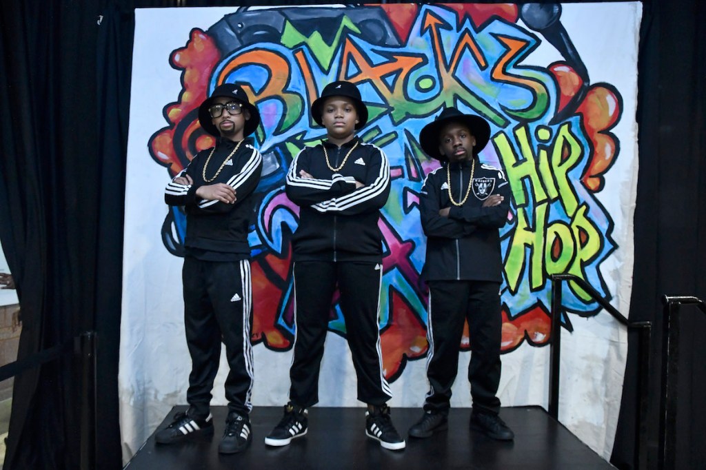 Actors Chyanna Burrows-Washington, Christopher Ephraim and Jacob Mulings portray the legendary group Run DMC. (Robert R. Roberts/The Washington Informer)