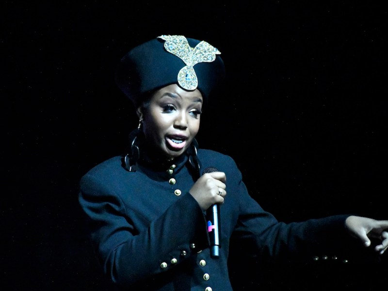 Tatum Primus performs as hip-hop superstar Queen Latifah at the 17th annual Blacks in Wax Museum show at THEARC in Ward 8 on March 8. (Robert R. Roberts/The Washington Informer)