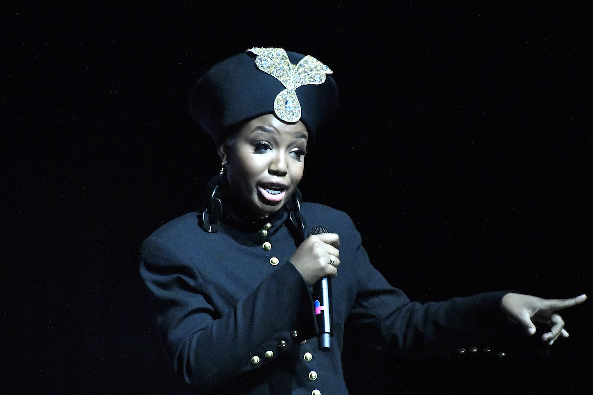 Tatum Primus performs as hip-hop superstar Queen Latifah at the 17th annual Blacks in Wax Museum show at THEARC in Ward 8 on March 8. (Robert R. Roberts/The Washington Informer)