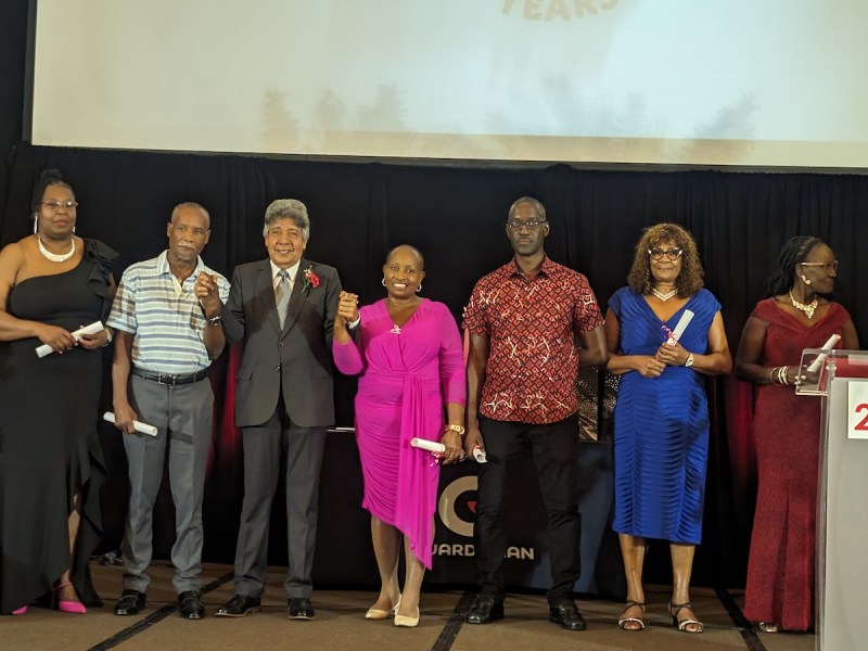 Long-serving past and present members of the Guardsman Barbados were recognized for their contribution to the organization's success. (Courtesy photo)