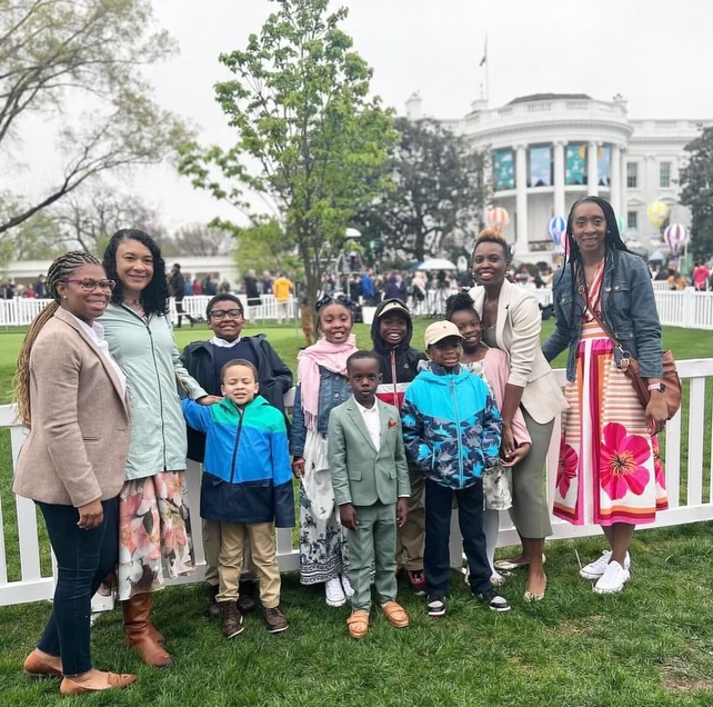 Children pose with their mothers from Jack and Jill of America while playing on the South Lawn. (Ashleigh Fields/The Washington Informer)